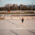 a woman running on a parking lot