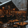 a group of people sitting at tables outside of a restaurant